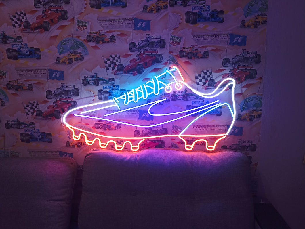 Football shoes neon sign, glowing soccer shoes, football shoes neon, bright football cleats, neon soccer cleats, glowing soccer footwear, neon sports shoes, light-up football shoes, soccer shoes with lights.